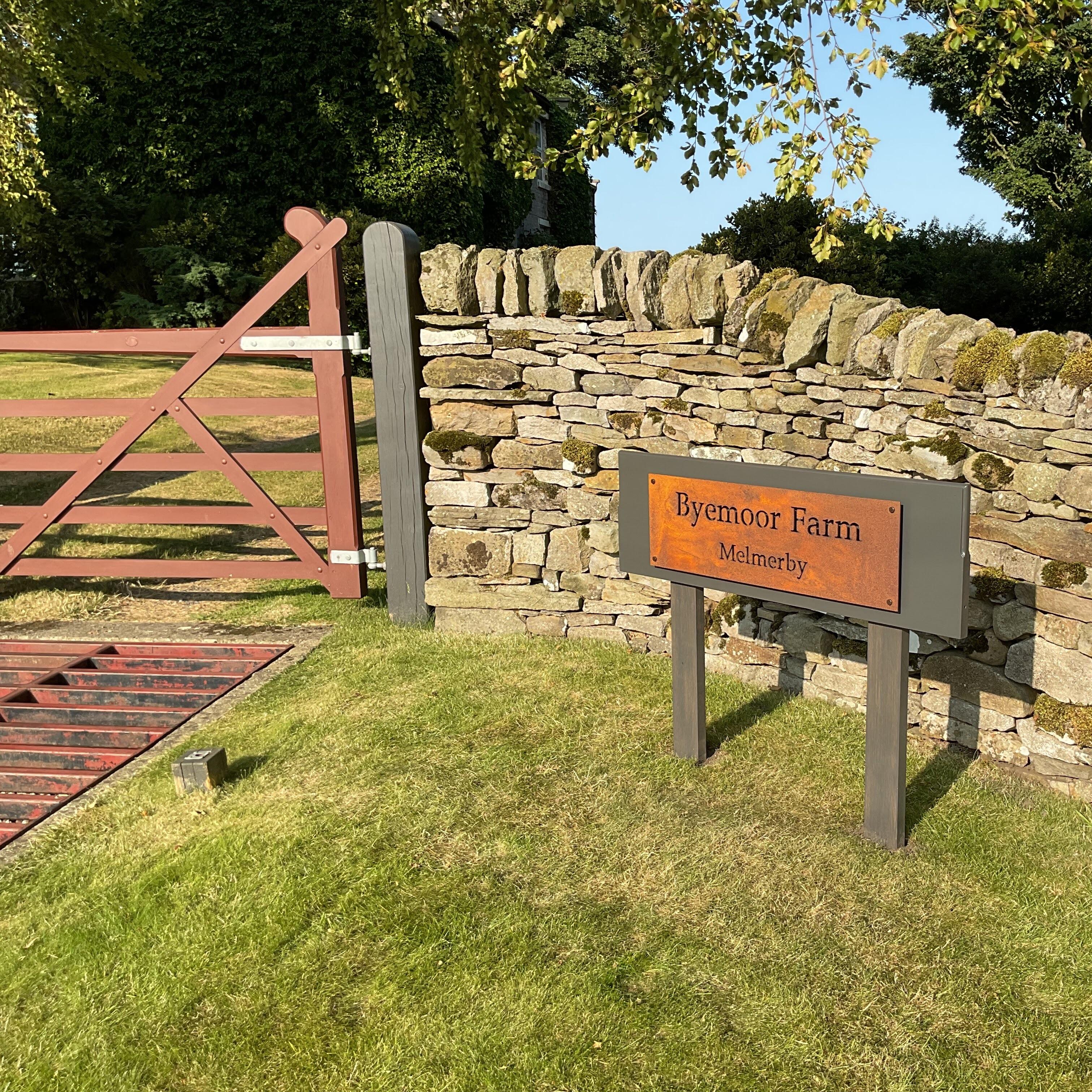 Classic Corten steel sign mounted by client