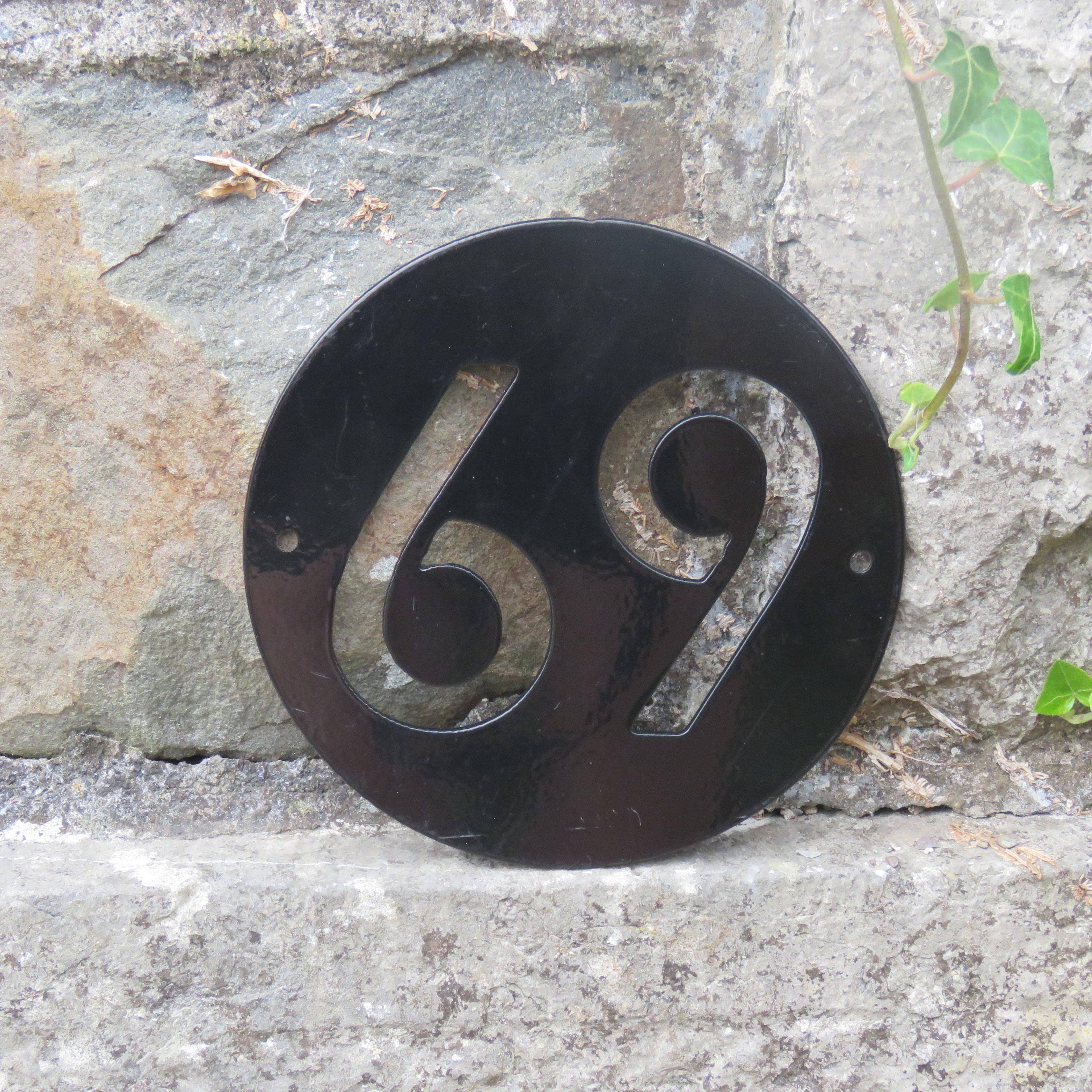 Metal house number sign