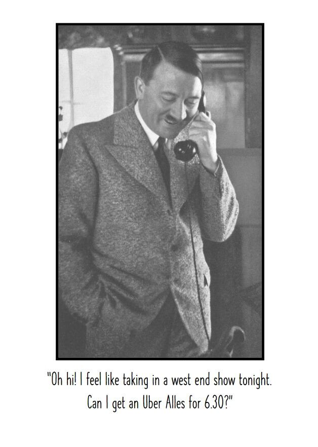 A photo of Hitler, out of uniform, talking on a telephone.