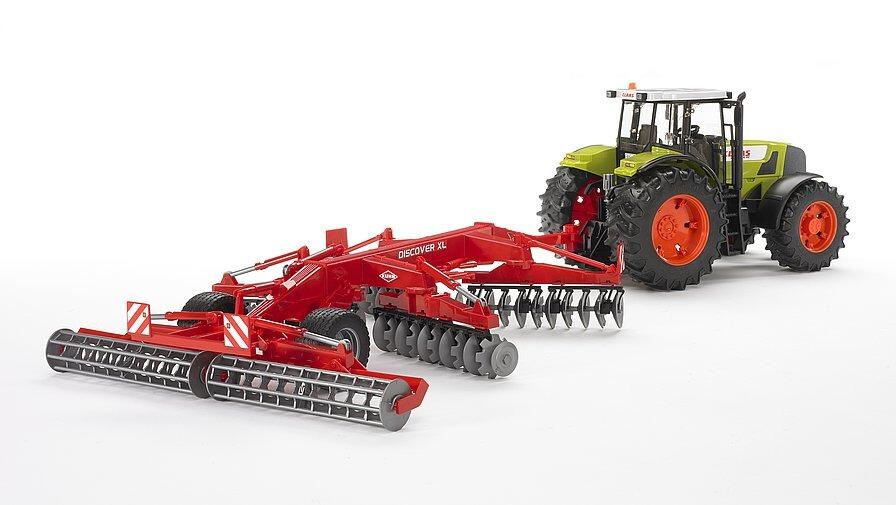 Bruder Kuhn Discover Xi Disc Harrow attached to a tractor