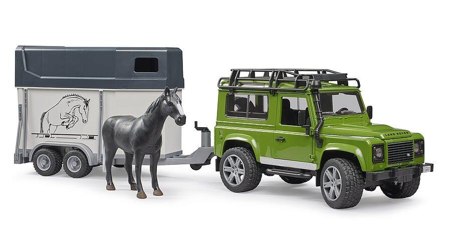 Bruder Land Rover Defender toy with horse trailer and horse figure – 1:16 scale.