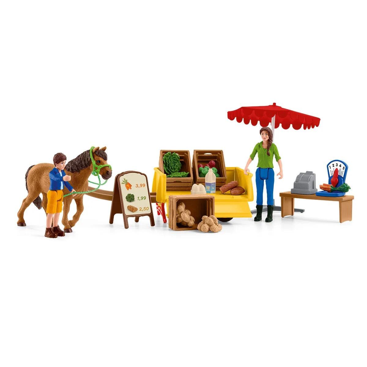 Full Schleich Sunny Day Mobile Farm Stand set with horse, stall, figures and produce accessories.