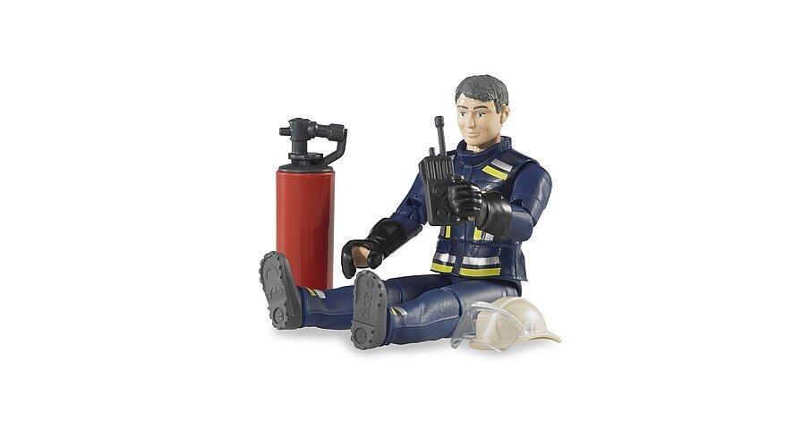 Bruder fireman figure sitting with extinguisher and accessories