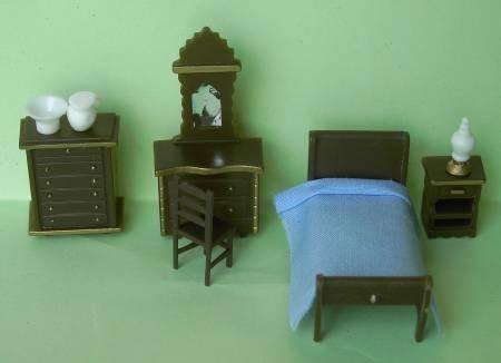 Set of 1/48th scale brown plastic furniture for the bedroom