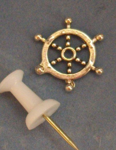 Miniature metal ships wheel suitable as a decorative item in 1/48th or 1/24th scale.