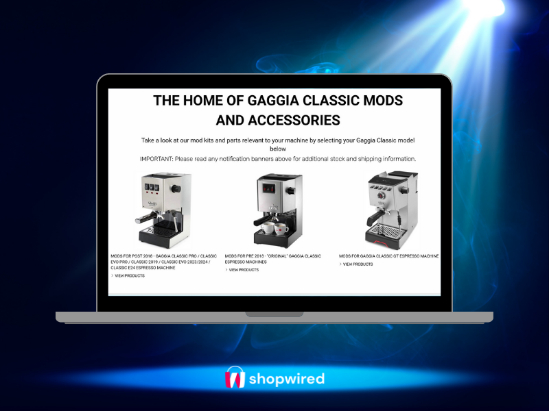 Laptop screen displaying Shades of Coffee Gaggia Classic mods and accessories page with three espresso machine models, on a blue spotlight background with ShopWired logo.