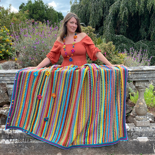 Anja from Ophelia Talks Crochet showing colourful crochet patterns