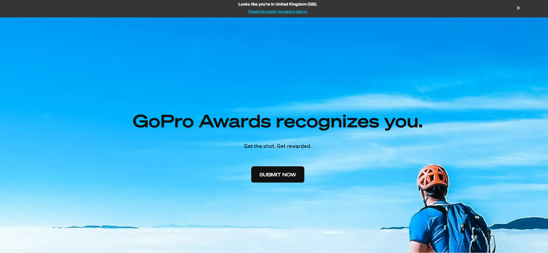 "Screenshot of GoPro Awards landing page with a cyclist looking at mountains, featuring the message 'GoPro Awards recognizes you' and a button to submit footage."