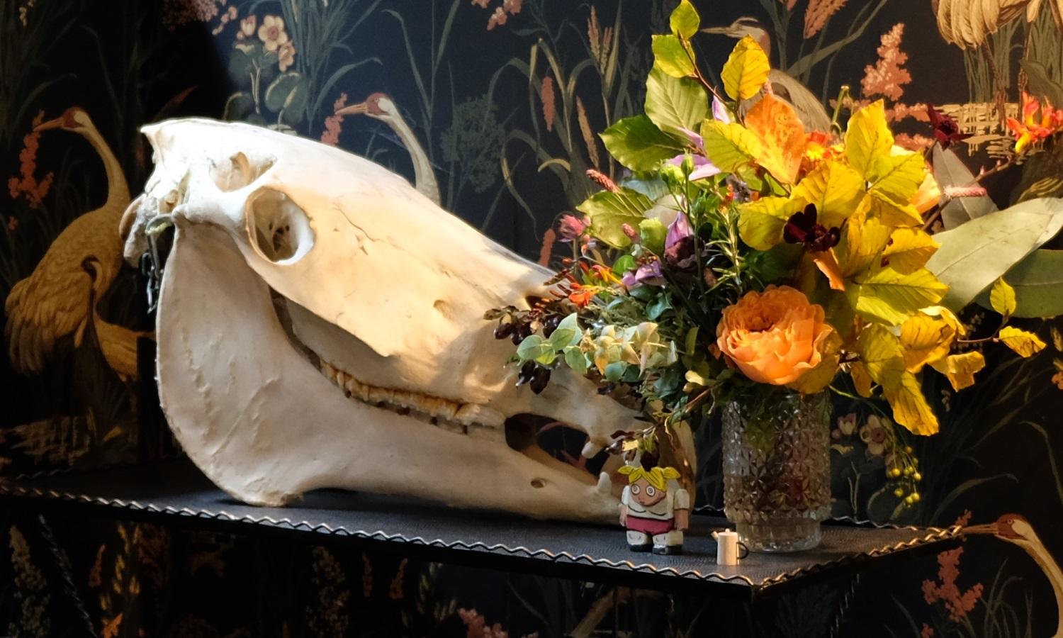Stunning dark, floral wallpaper and animal skull in De Beauvoir Townhouse for Living Etc.