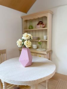 pink dolls house vase
