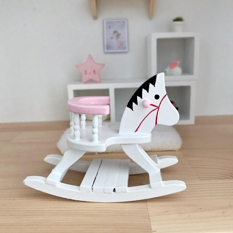 Pink and cheap white rocking horse