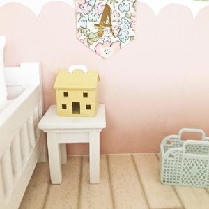 white wooden miniature bedside table