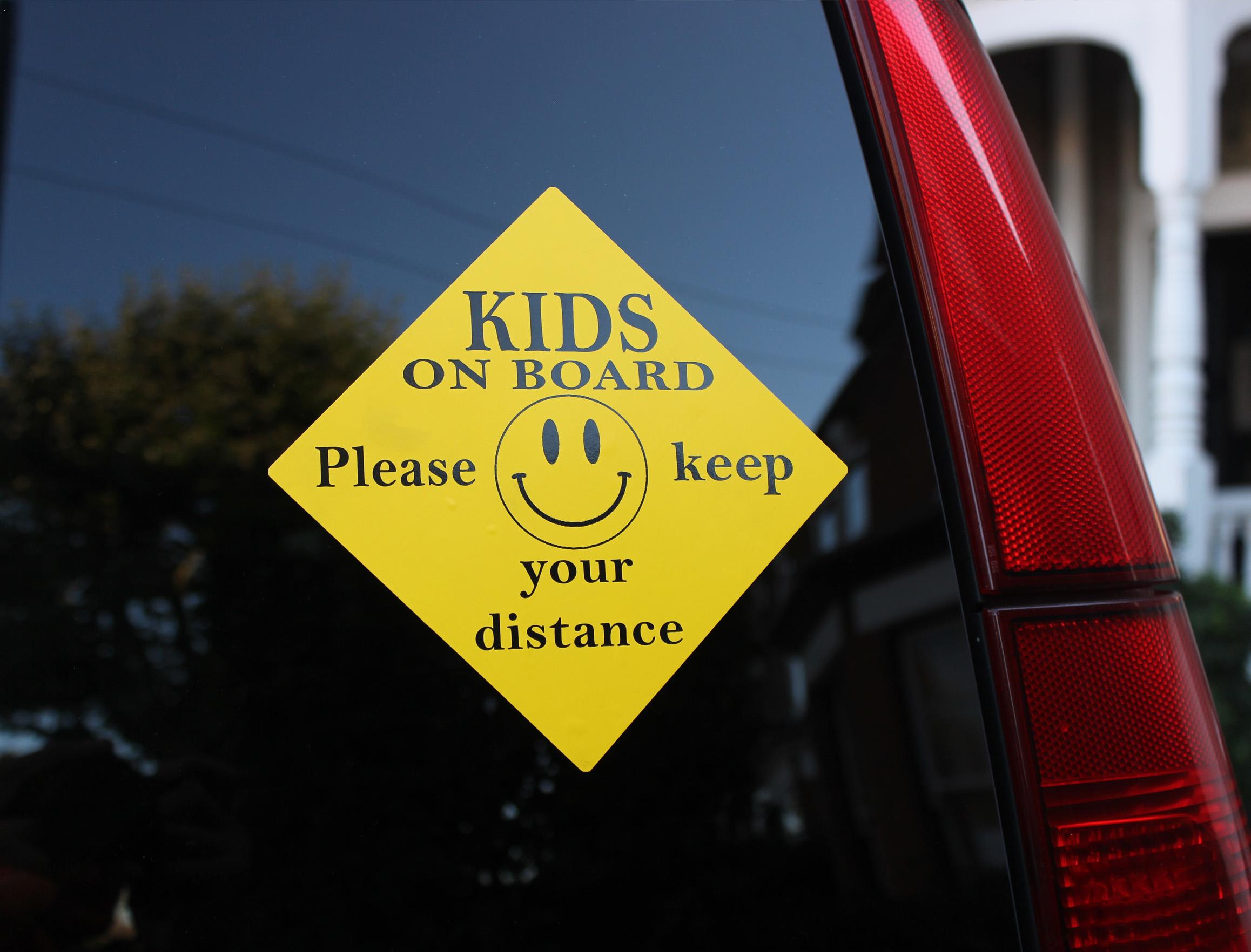 Kids on board sticker on car