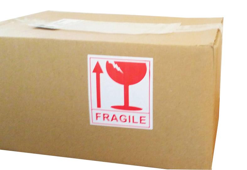 Fragile Sticker on Cardboard Box