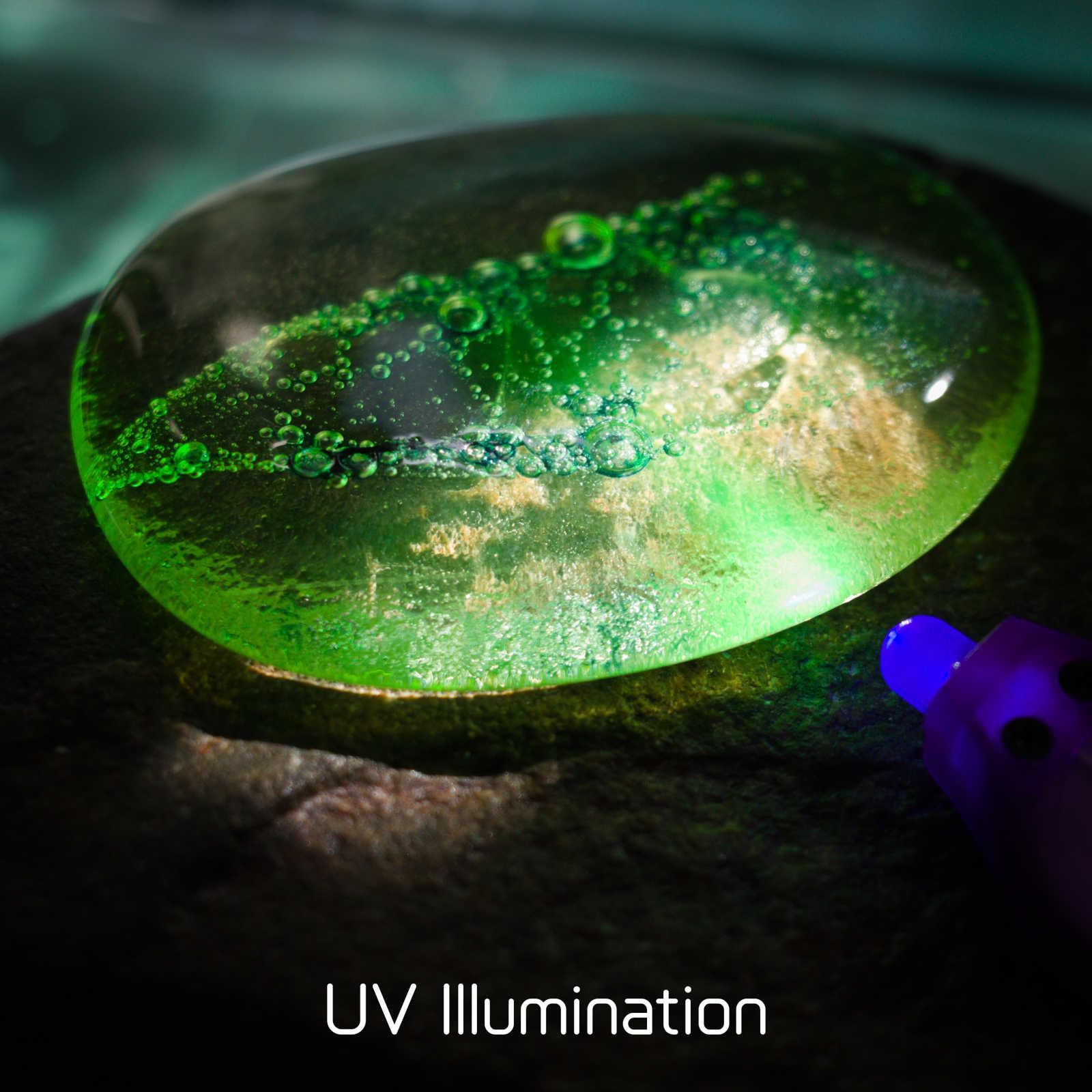 Uranium Glass, hearts motif under UV light