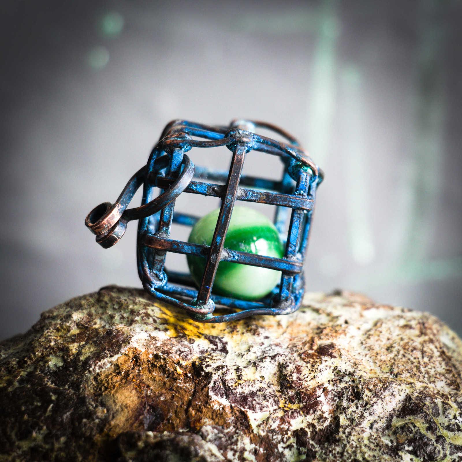 Captured in a Cage, Uranium Glass Marble