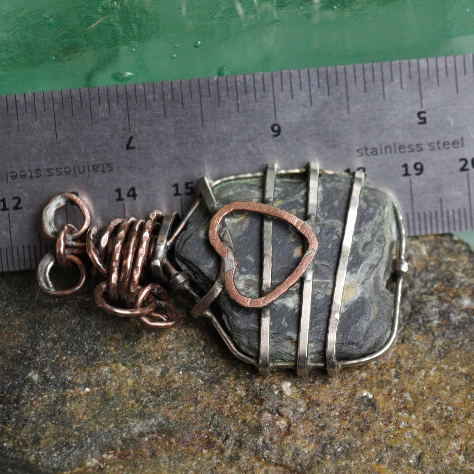 sea slate accessory, with ruler to show scale