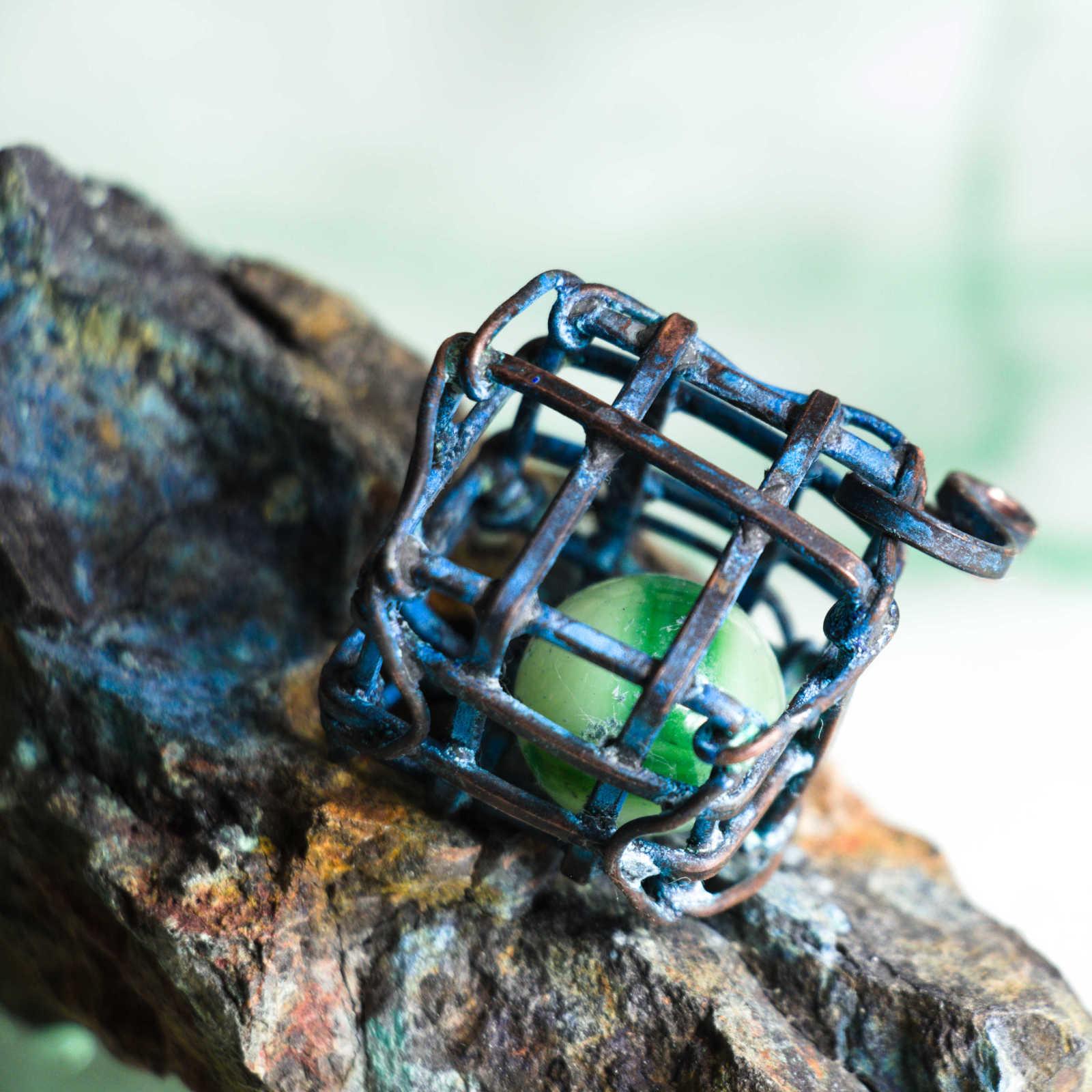Captured in a Cage, Uranium Glass Marble