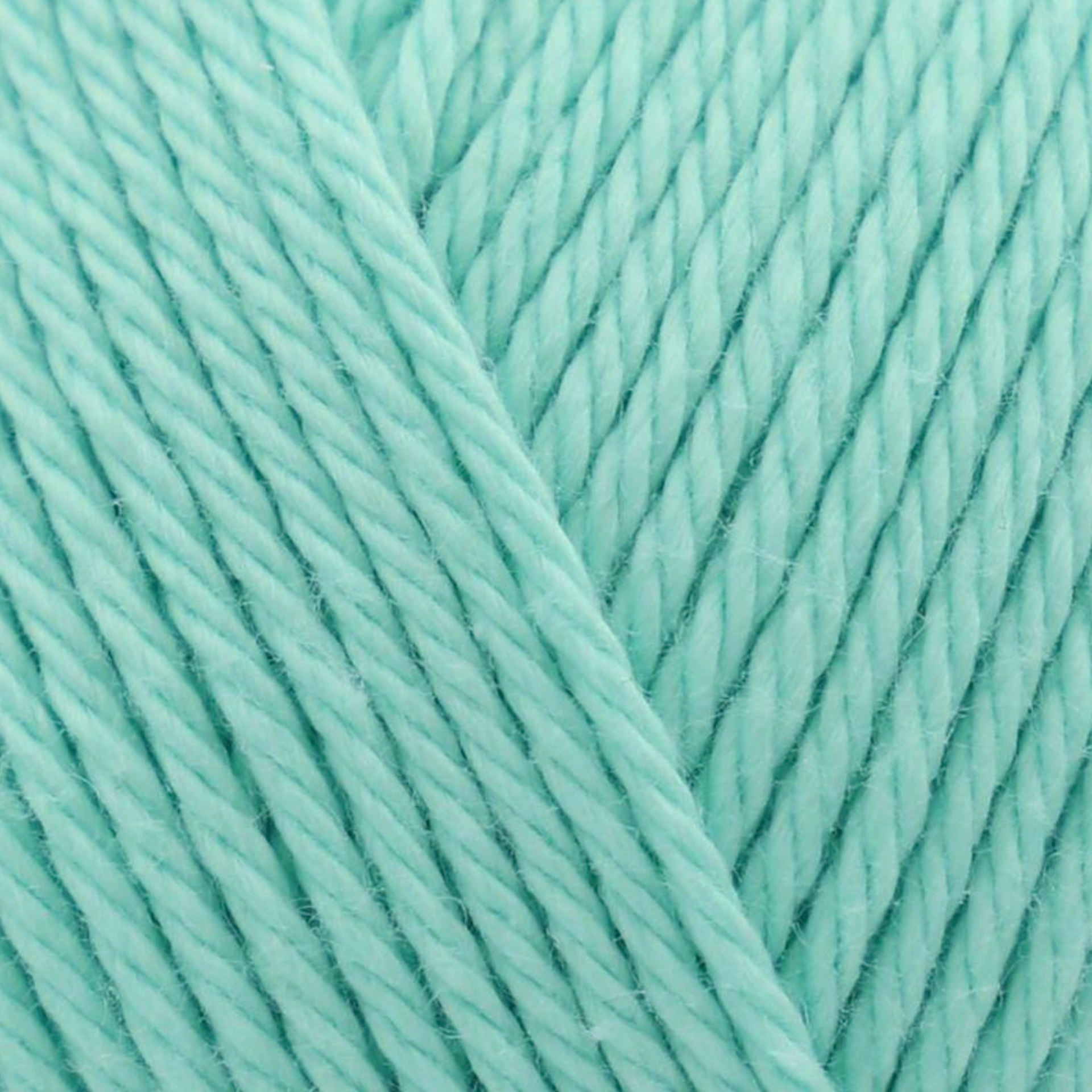 James C. Brett It’s Pure Cotton DK yarn Soft Green IC27, 100% cotton DK yarn texture in a fresh pastel aqua green shade.