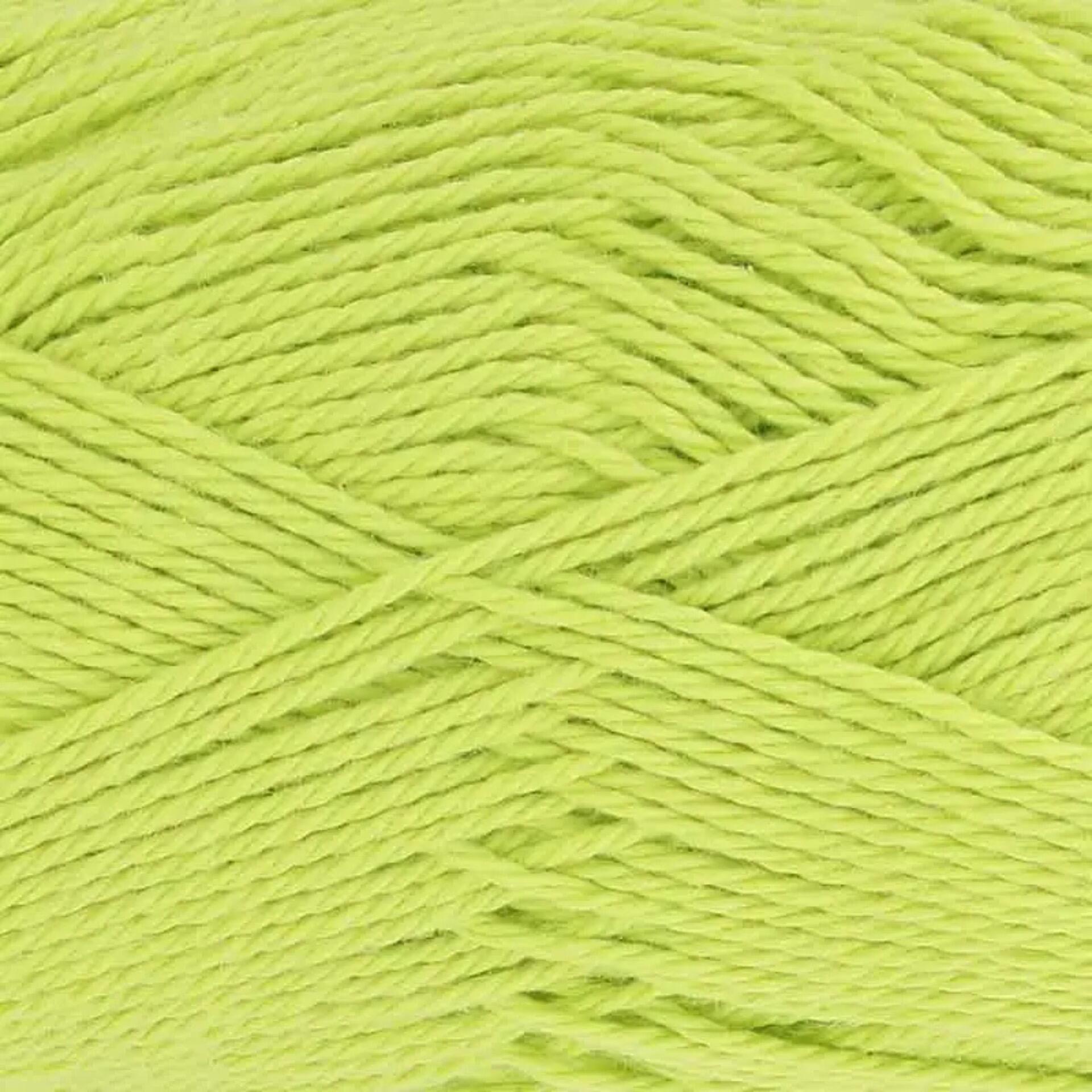 Close-up of King Cole Cottonsoft yarn in Citron, shade number 5704. The yarn features a bright, fresh yellow-green color with a soft, smooth texture, perfect for crochet and knitting projects.