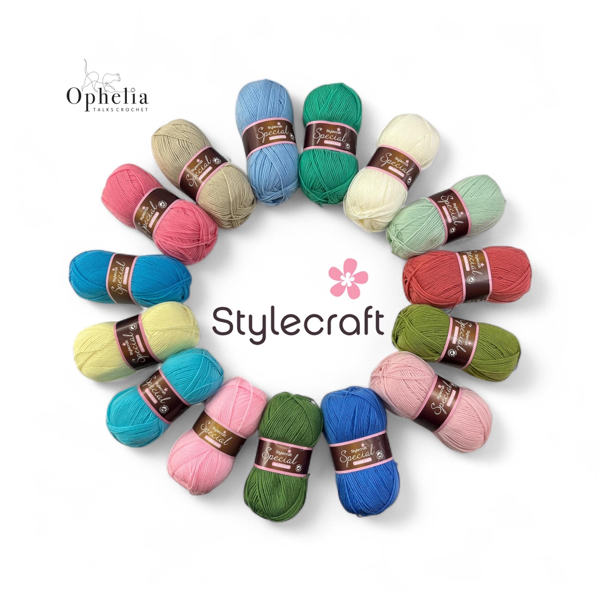Flat lay of 15 colourful balls of Stylecraft Special DK yarn arranged in a circle, featuring bright and pastel jelly bean-inspired shades. Labelled as the Jelly Beans Yarn Pack by Ophelia Talks Crochet.