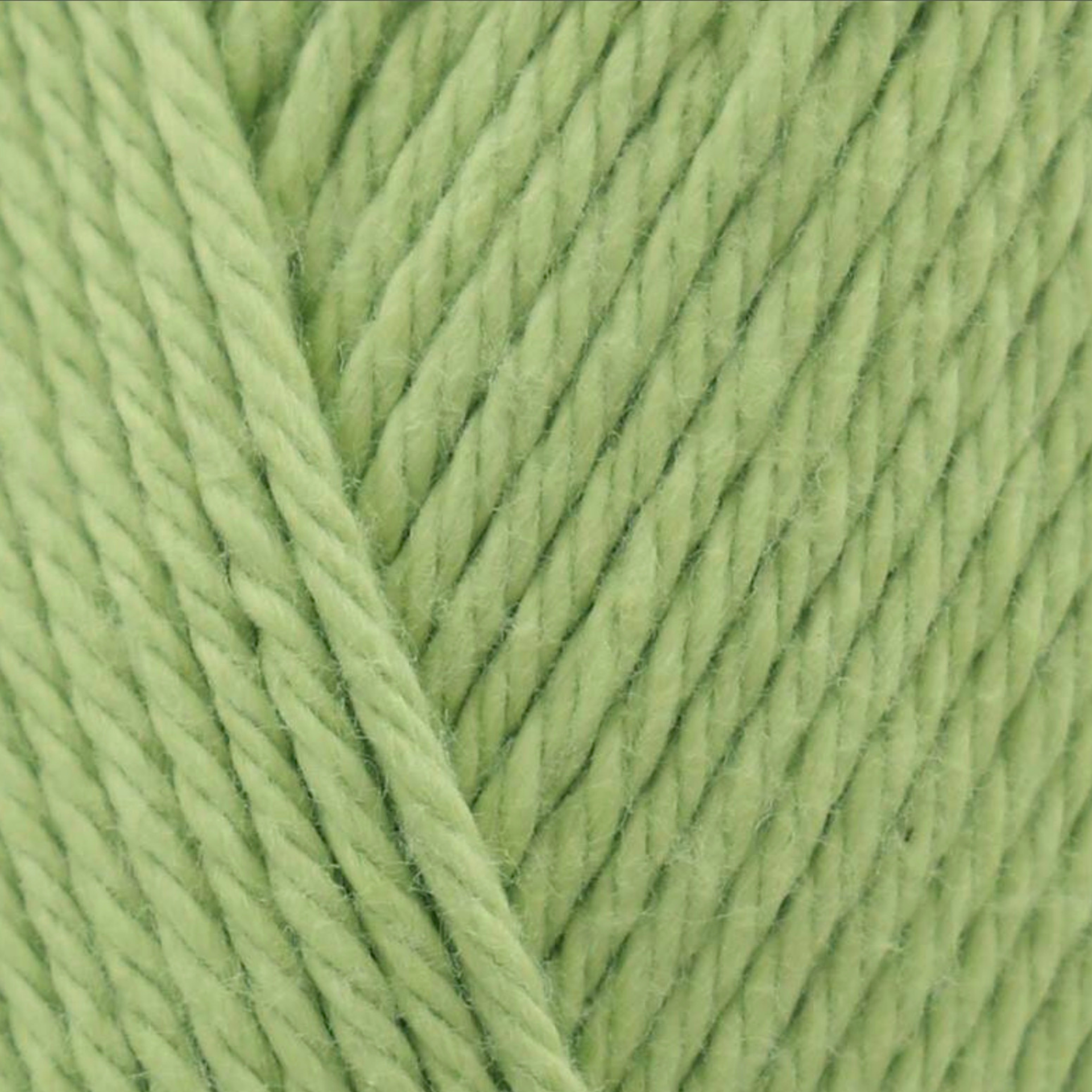 James C. Brett It’s Pure Cotton DK yarn Lime IC13, 100% cotton DK yarn texture in a bright fresh lime green shade.