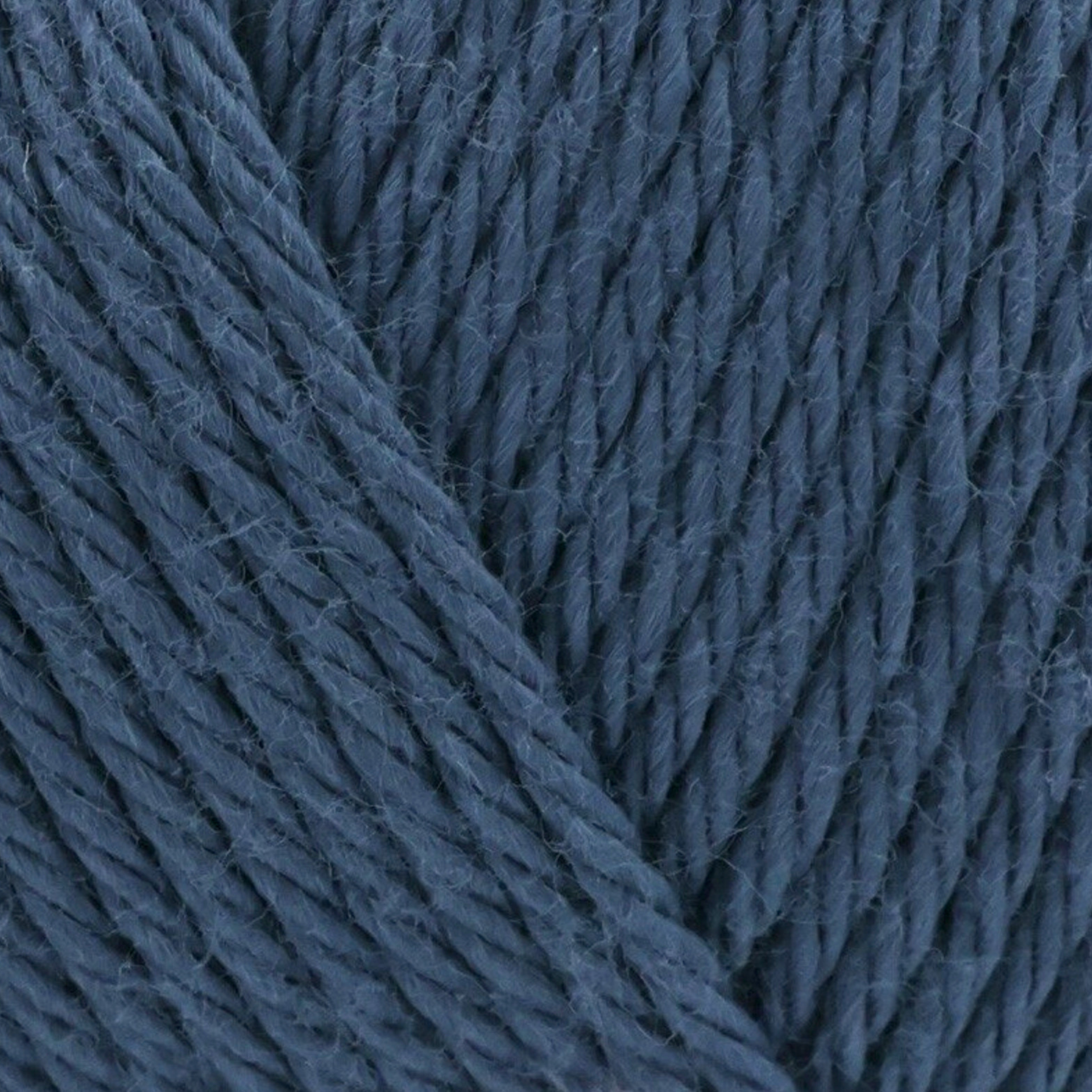 James C. Brett It’s Pure Cotton DK yarn French Navy IC48, 100% cotton DK yarn texture in a deep navy blue shade.