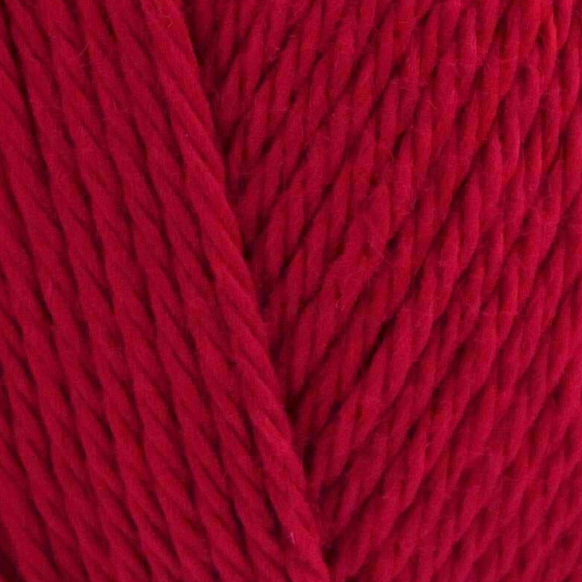 James C. Brett It’s Pure Cotton DK yarn Red IC12, 100% cotton DK yarn texture in a rich true red shade.