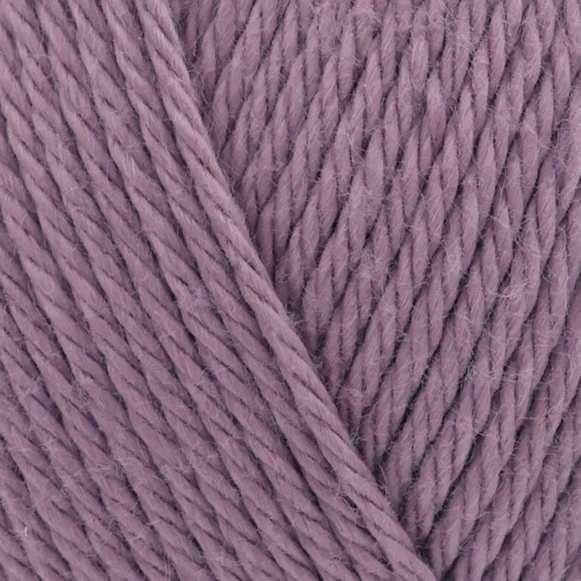 James C. Brett It’s Pure Cotton DK yarn Antique Rose IC17, dusty pink 100% cotton DK yarn texture close-up.