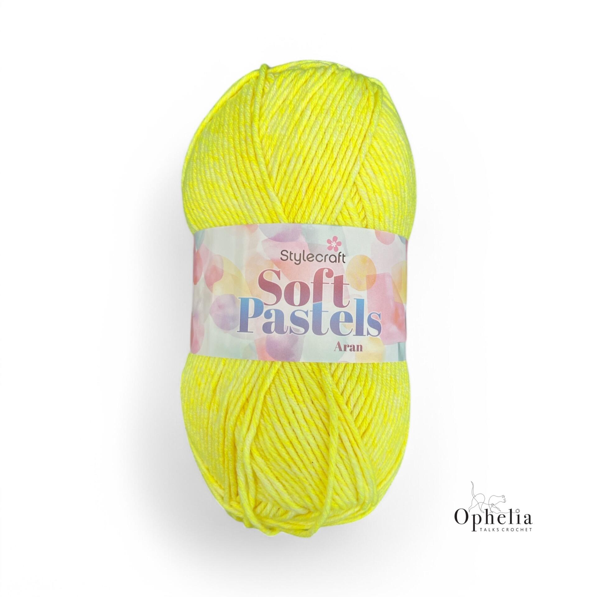 Close-up of Stylecraft Soft Pastels Aran yarn in Lemon (5654), showcasing its vibrant pastel yellow color and smooth texture