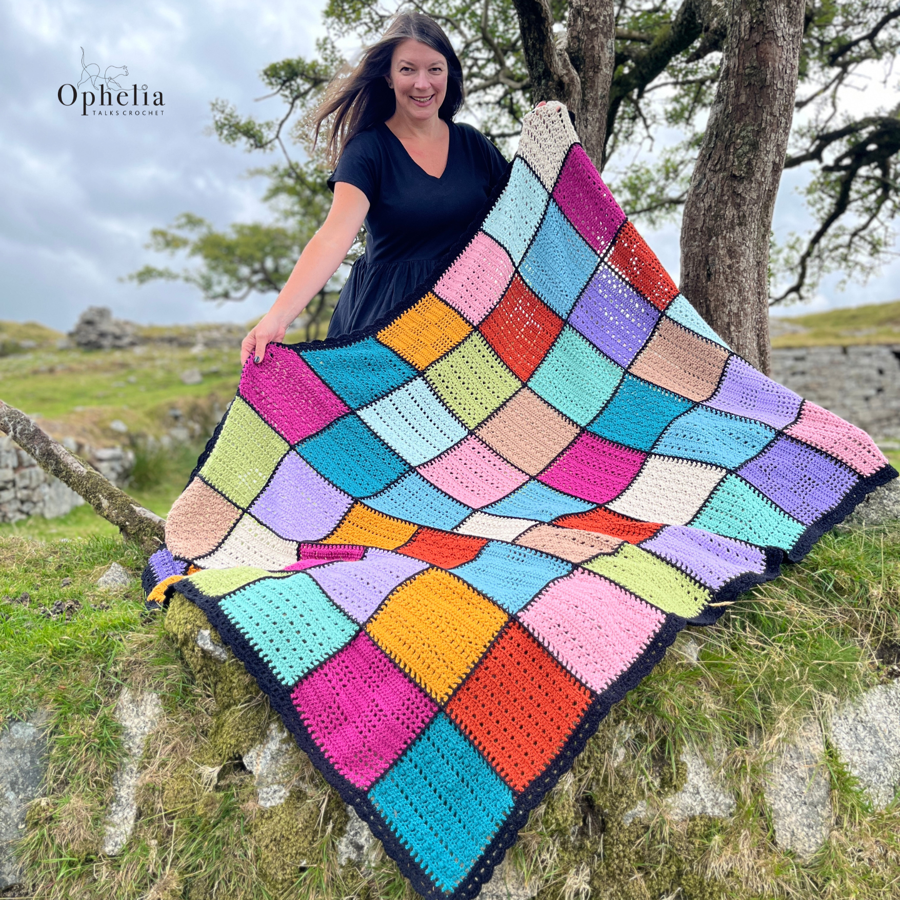Anja showing the compete anniversary blanket