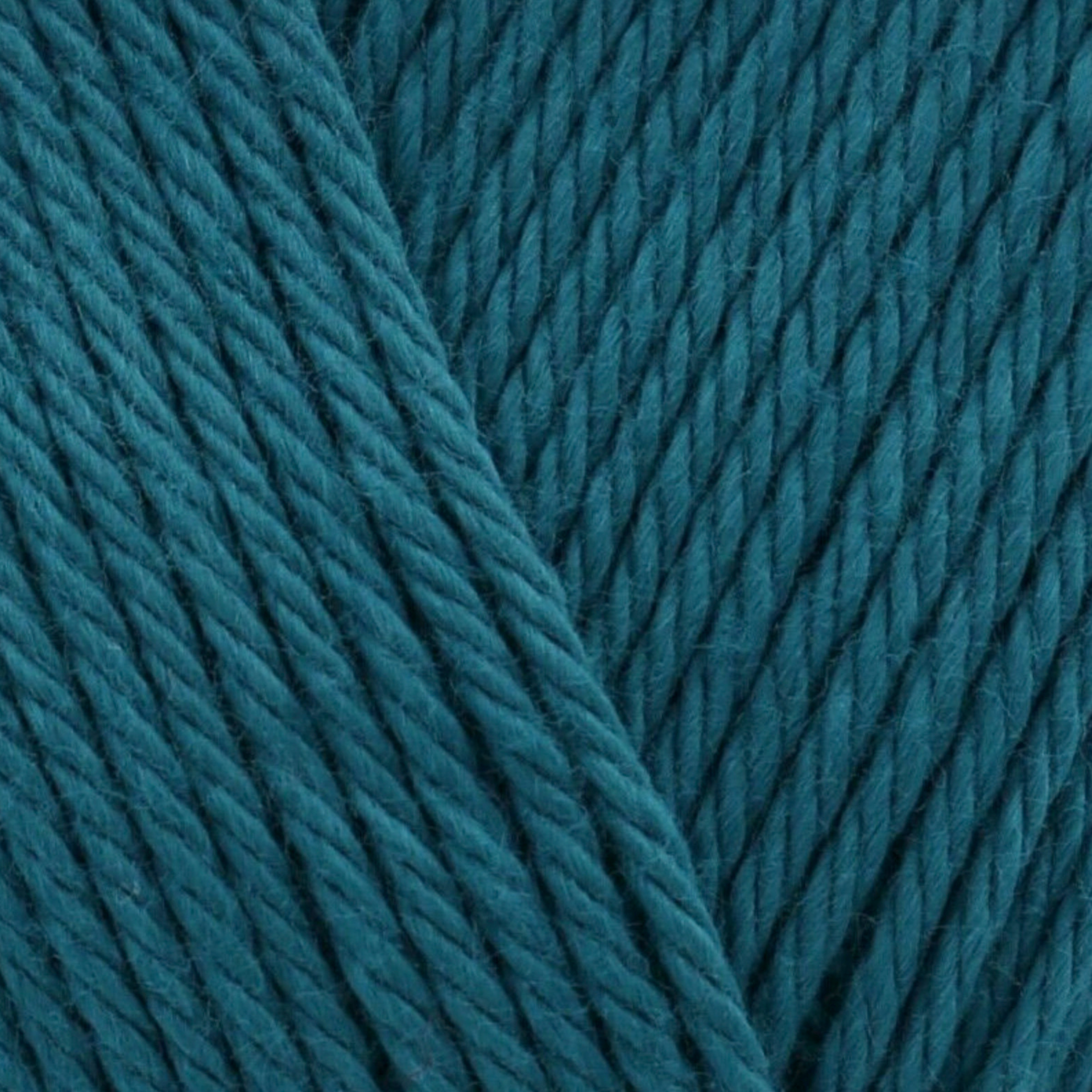 James C. Brett It’s Pure Cotton DK yarn Deep Ocean IC29, 100% cotton DK yarn texture in a rich deep blue-green shade.