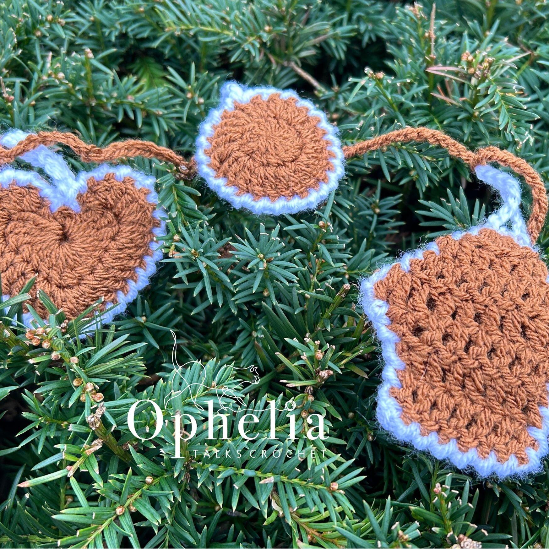 Christmas ornaments crochet heart, biscuit and house in gingerbread and white