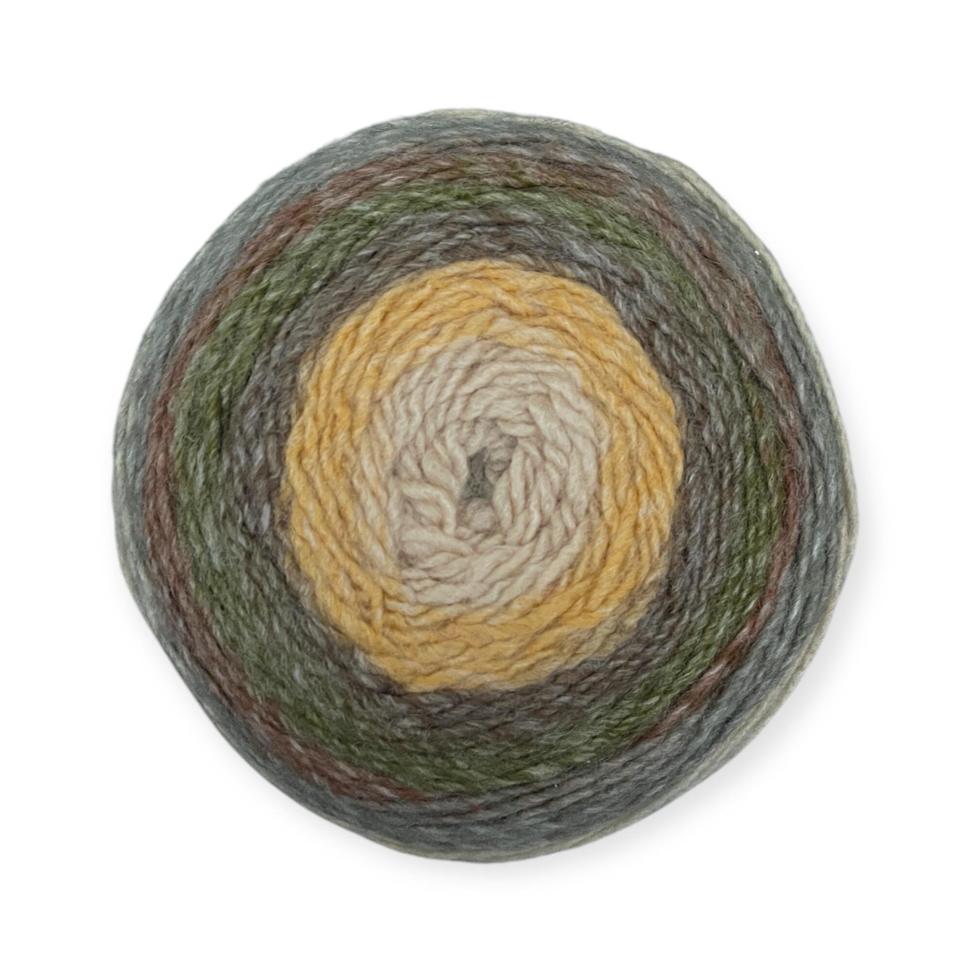 Gradient yarn cake of King Cole Curiosity DK in Camouflage (2898), featuring earthy tones of cream, gold, green, and brown, ideal for knitting and crochet projects.