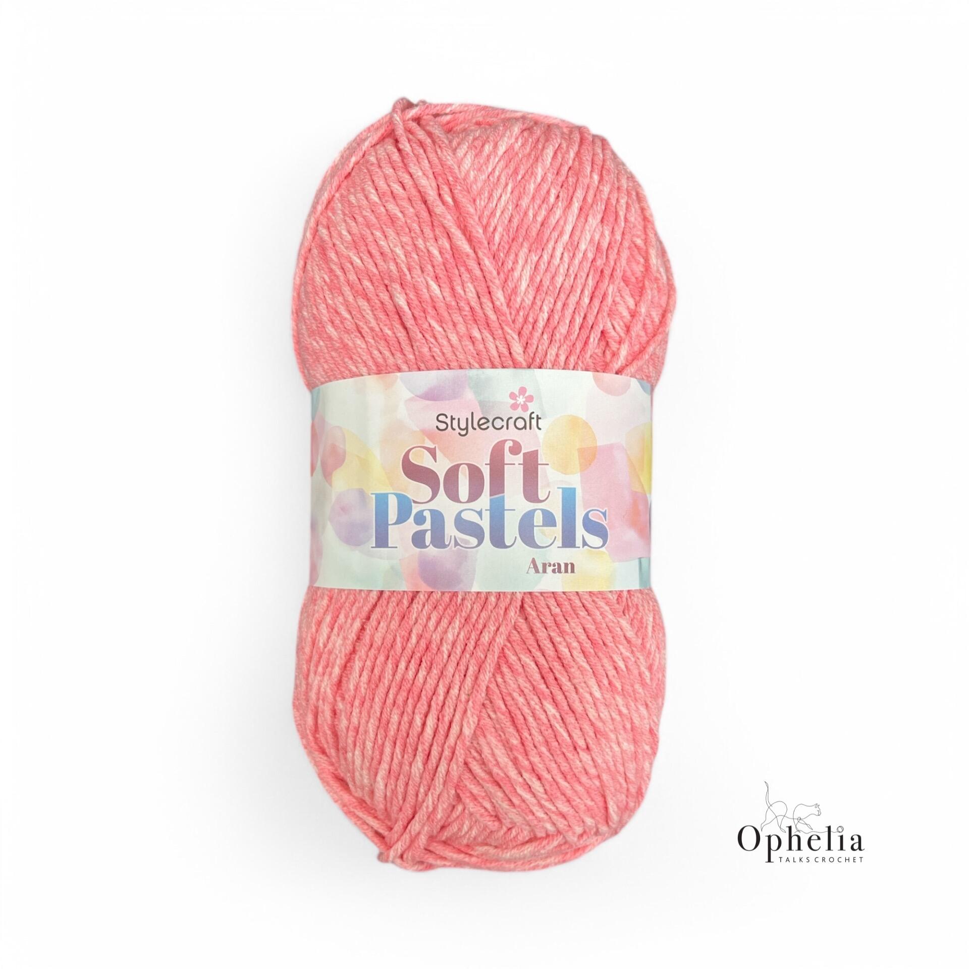 Close-up of Stylecraft Soft Pastels Aran yarn in Strawberry (5653), showcasing its soft pastel pink color and smooth texture.