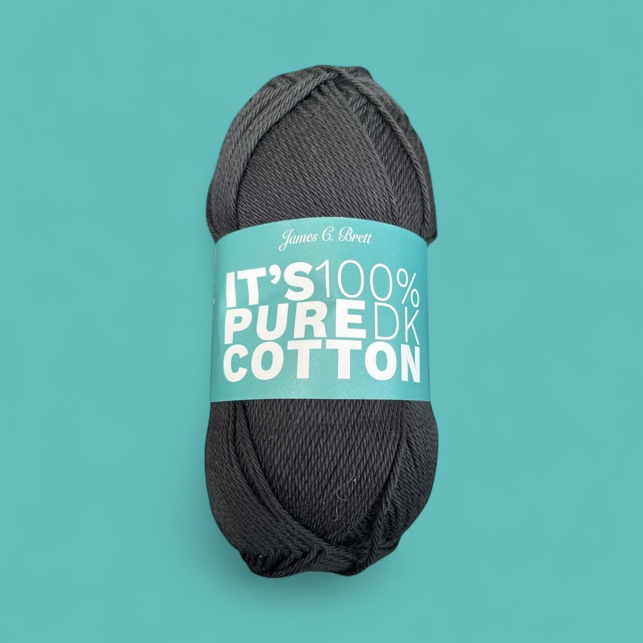 James C. Brett It’s Pure Cotton DK yarn ball in black with turquoise label, 100% cotton double knitting yarn, part of the 48-shade range.