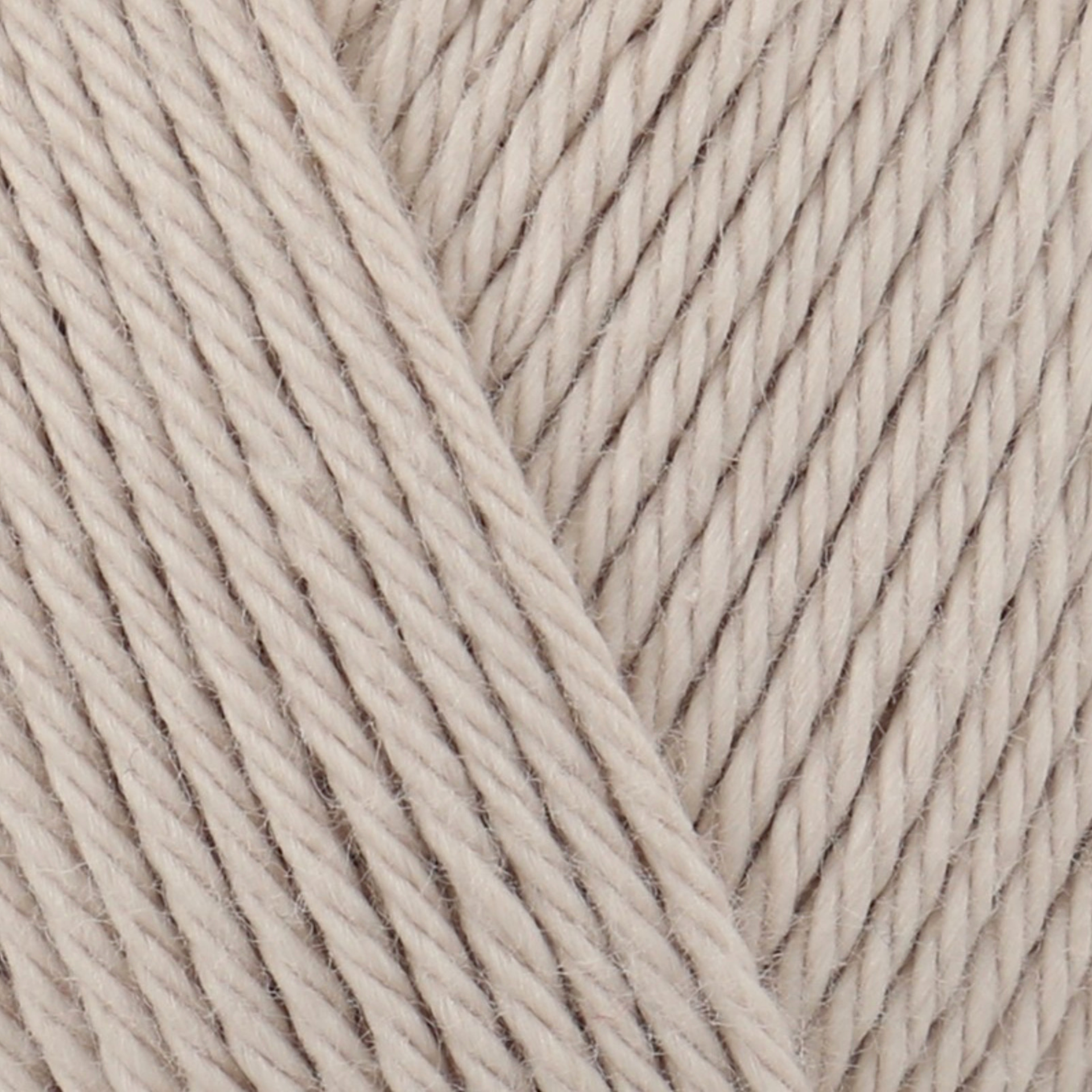 James C. Brett It’s Pure Cotton DK yarn in Sand IC01, close-up of 100% cotton DK yarn texture, soft neutral beige shade, ideal for crochet and knitting projects.