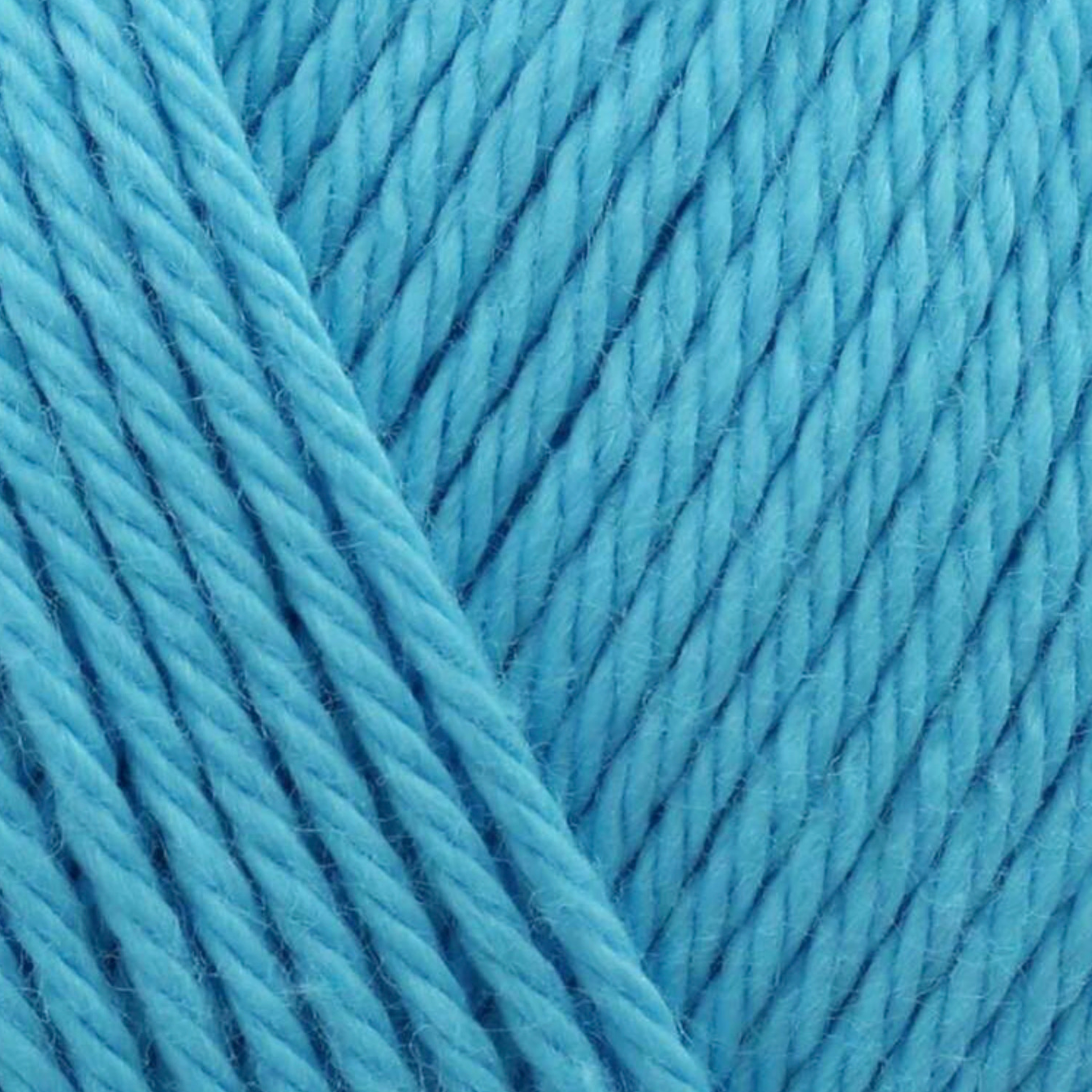 James C. Brett It’s Pure Cotton DK yarn Turquoise IC08, 100% cotton DK yarn texture in a bright vibrant turquoise blue shade.