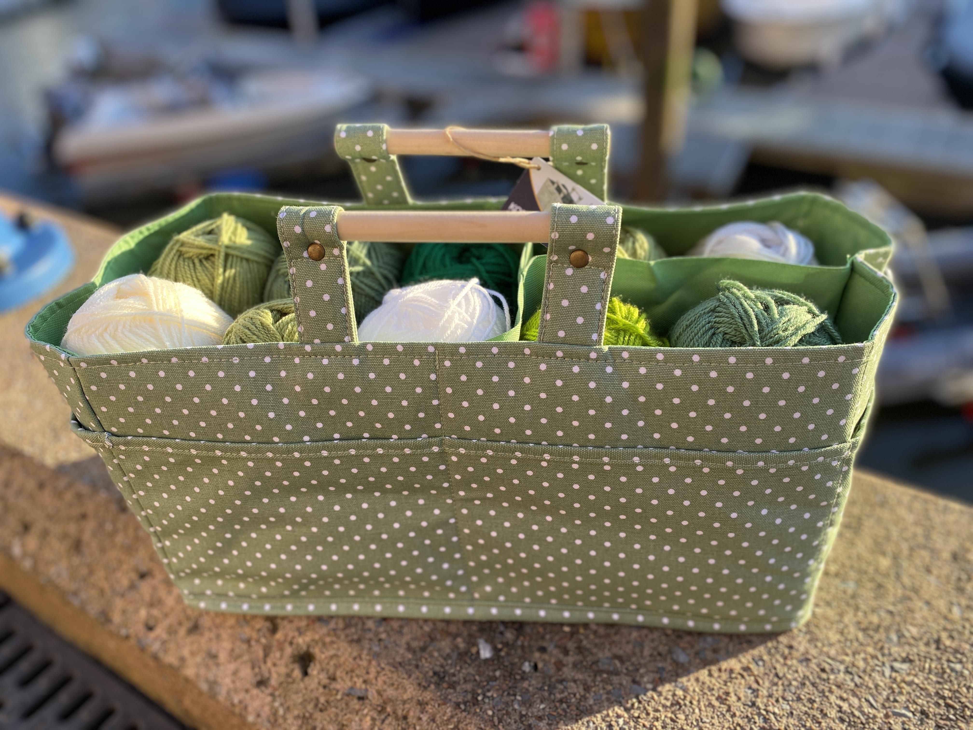 sage green carry tote full of yarn