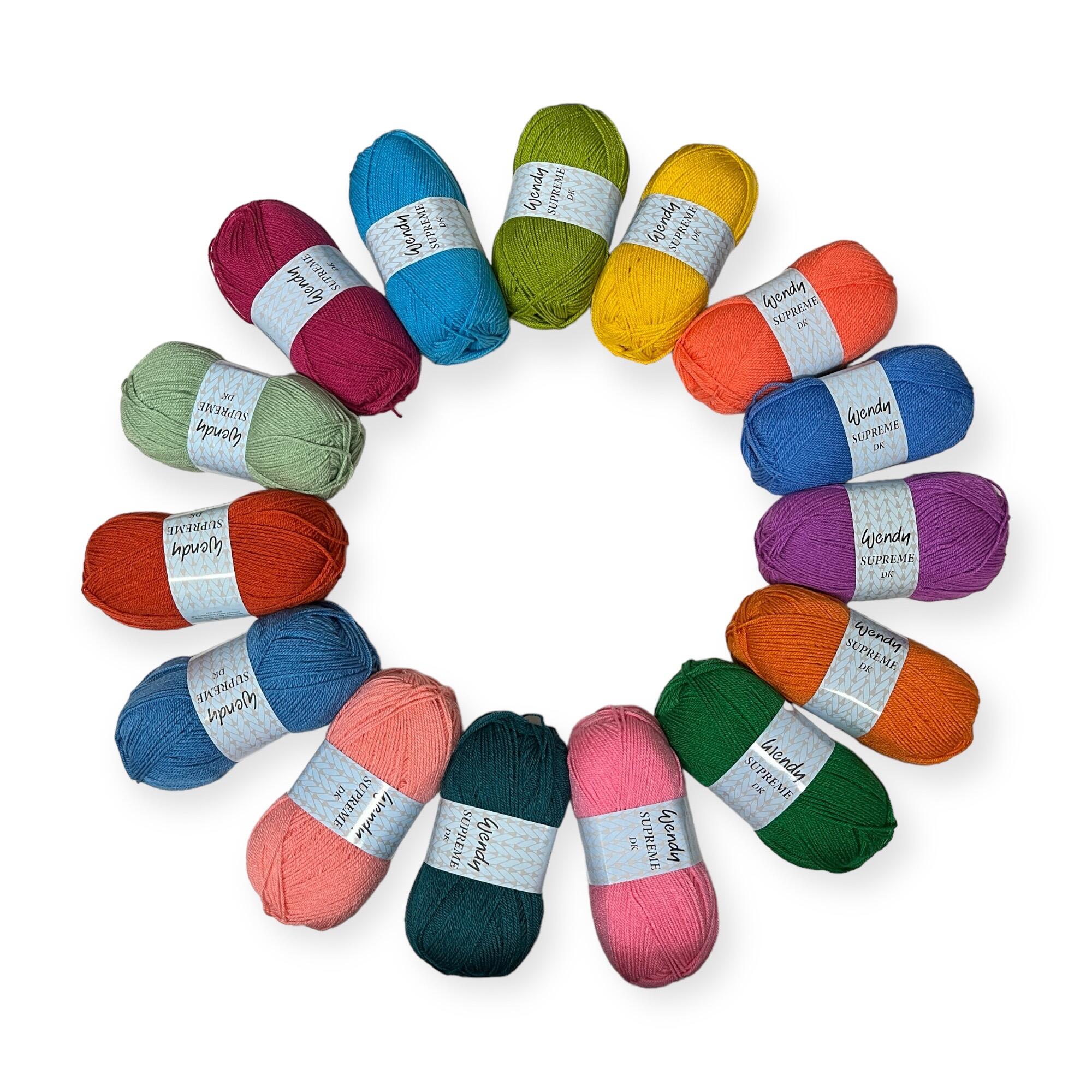 All hues of the festival of colours yarn pack presented  in a circle