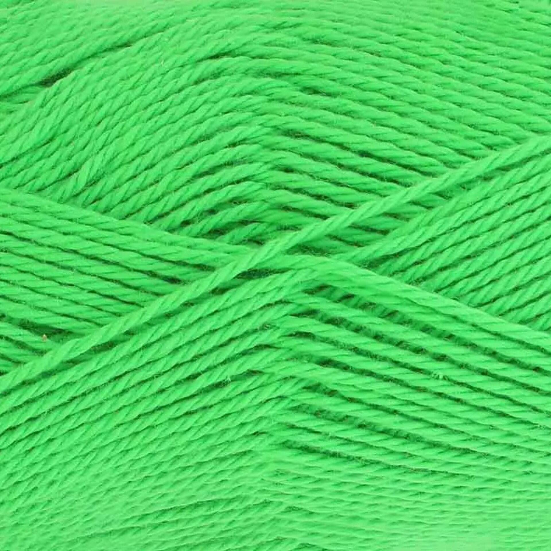 Close-up of King Cole Cottonsoft yarn in Emerald, shade number 5702. The yarn features a vibrant, rich green color with a soft, smooth texture, perfect for crochet and knitting projects.