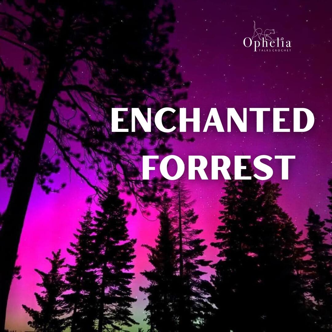 Silhouetted pine trees against a vibrant night sky in shades of pink, purple, and green with stars scattered above. The words 'ENCHANTED FORREST' appear in bold white letters across the center, with the Ophelia Talks Crochet logo in the top right corner.