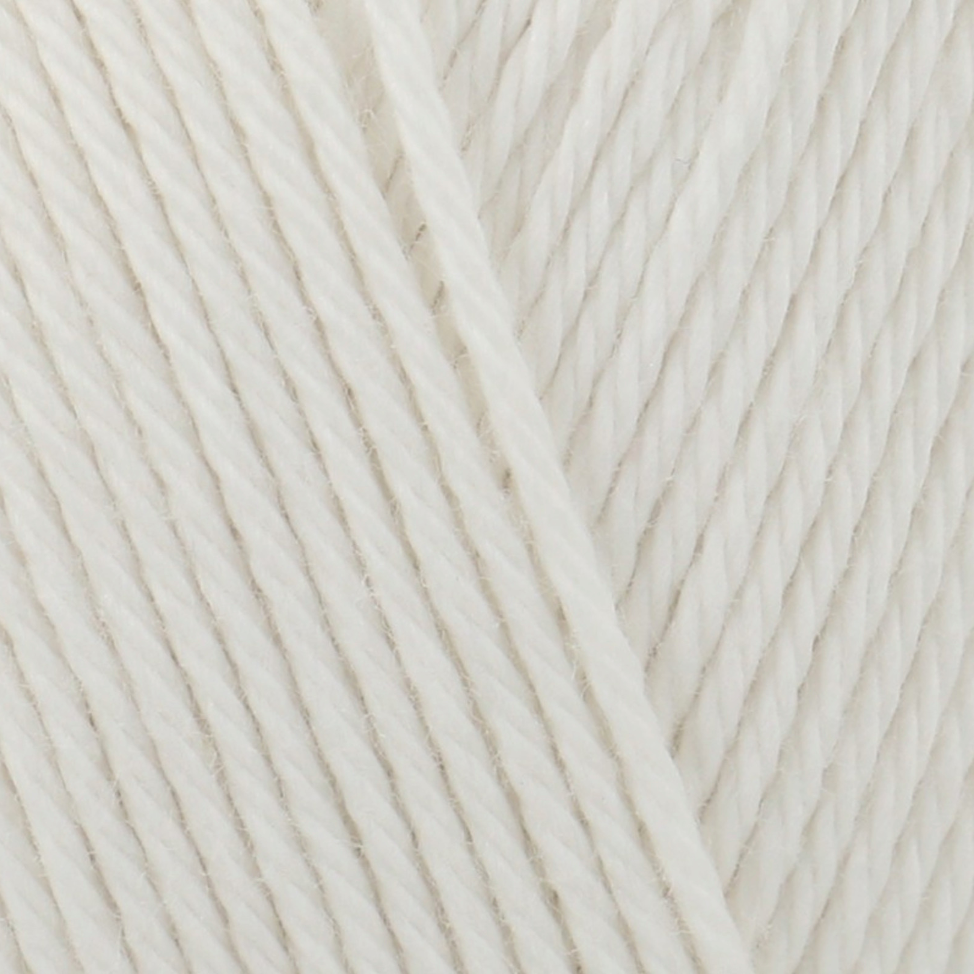 James C. Brett It’s Pure Cotton DK yarn Cream IC09, 100% cotton DK yarn texture in a soft natural cream shade.