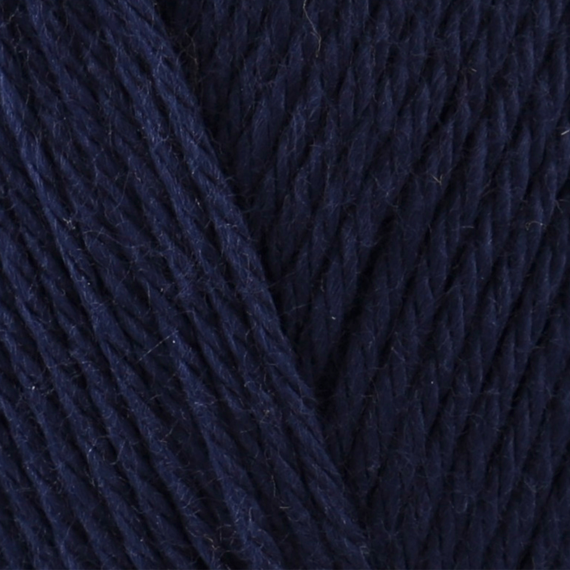 James C. Brett It’s Pure Cotton DK yarn Navy IC11, 100% cotton DK yarn texture in a deep classic navy blue shade.