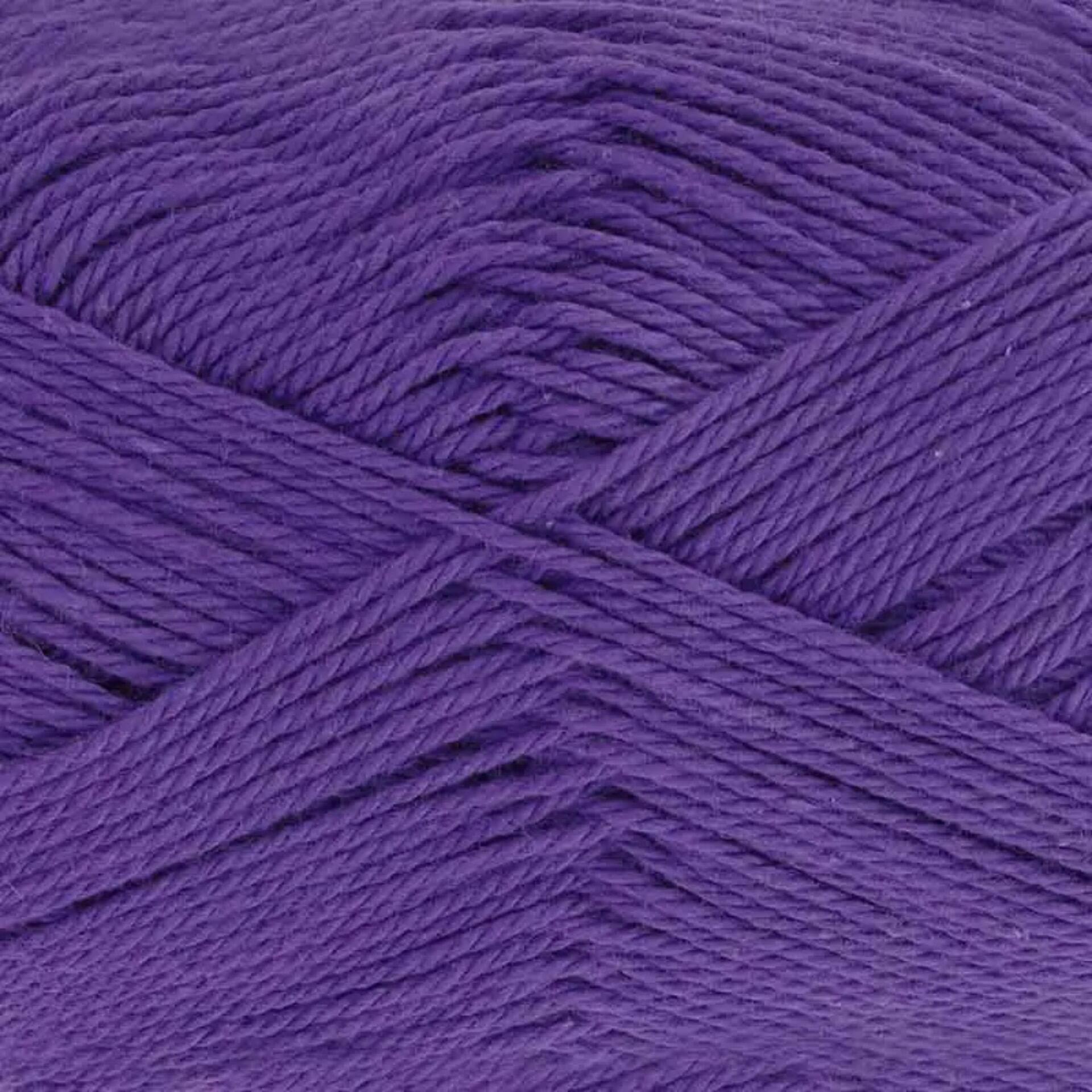 Close-up of King Cole Cottonsoft yarn in Midnight Sky, shade number 5705. The yarn features a deep, rich purple color with a soft, smooth texture, perfect for crochet and knitting projects.