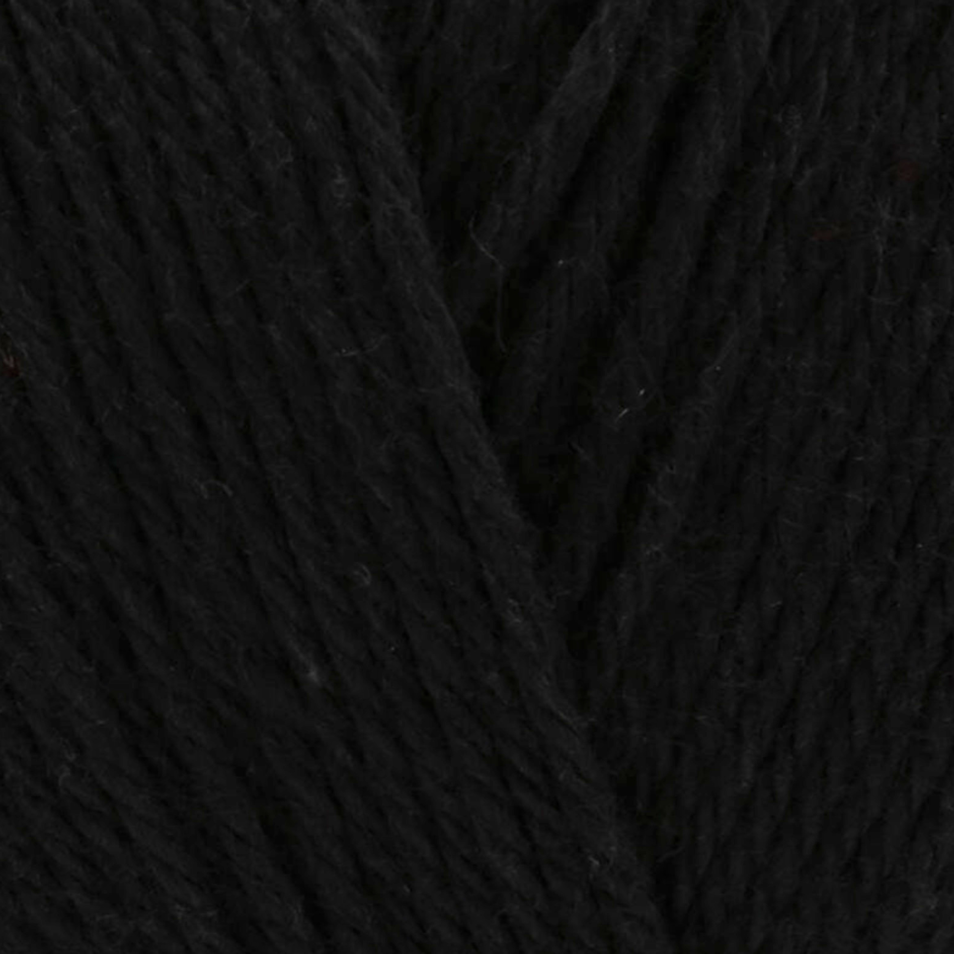 James C. Brett It’s Pure Cotton DK yarn Black IC19, 100% cotton DK yarn texture, deep solid black shade.