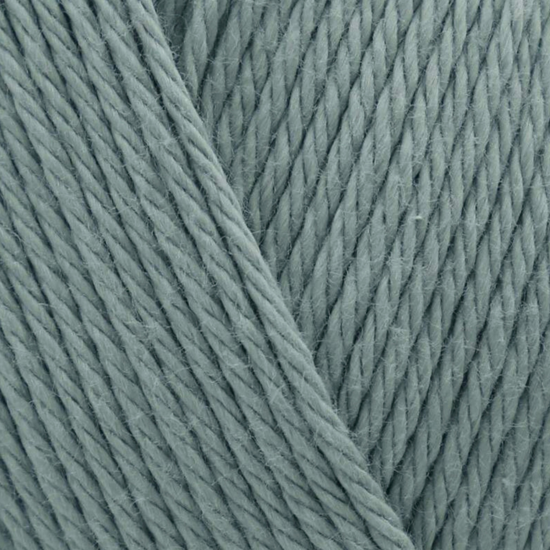 James C. Brett It’s Pure Cotton DK yarn Sage IC16, soft muted green 100% cotton DK yarn texture close-up.