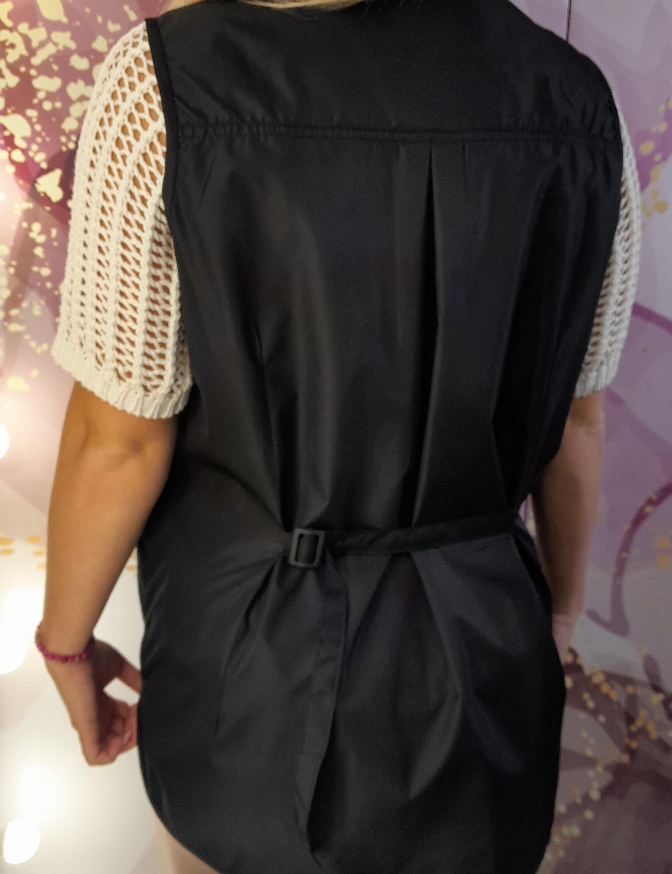 Water-resistant black salon vest for hairstylists and groomers