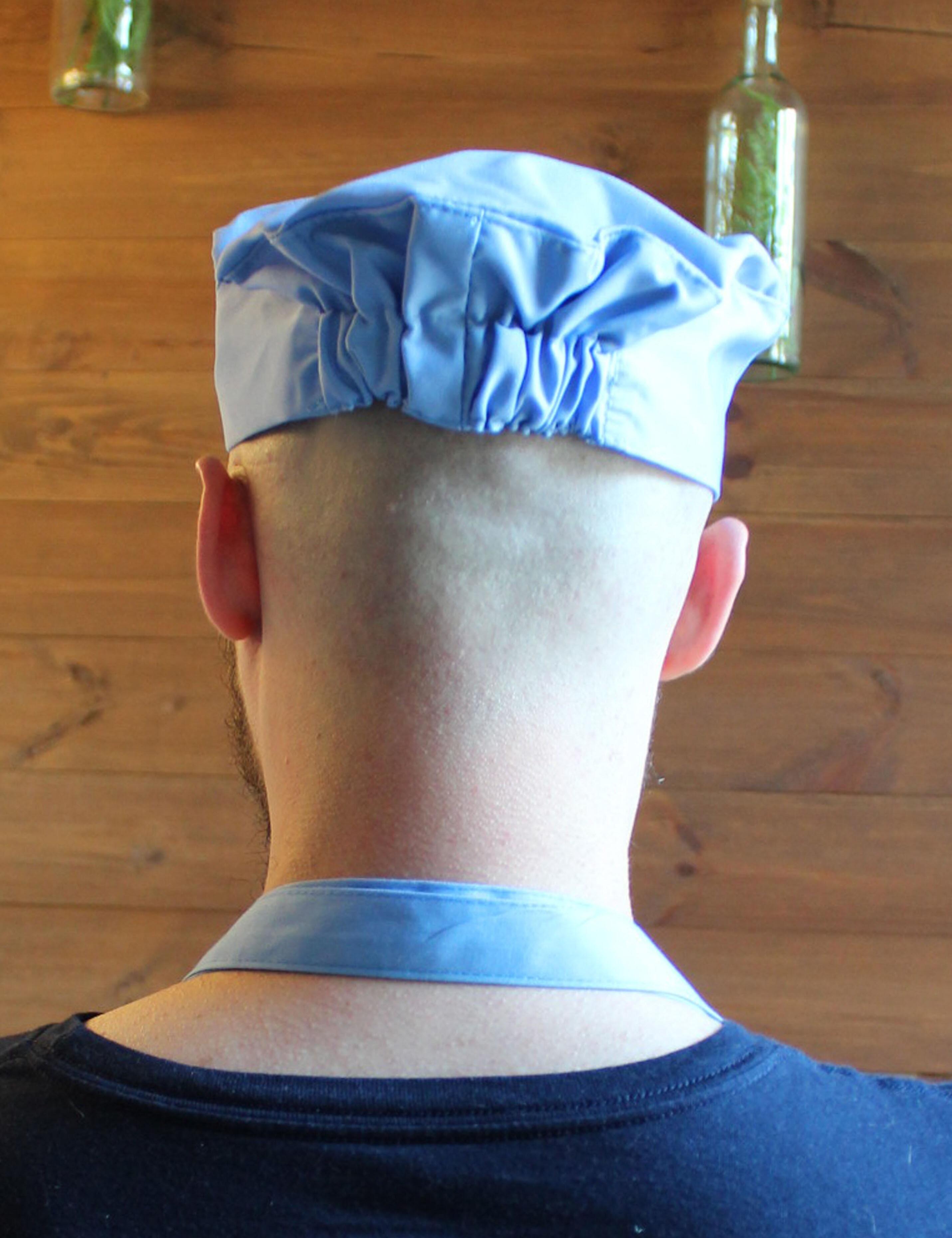 Professional chef skull cap in light blue color close-up