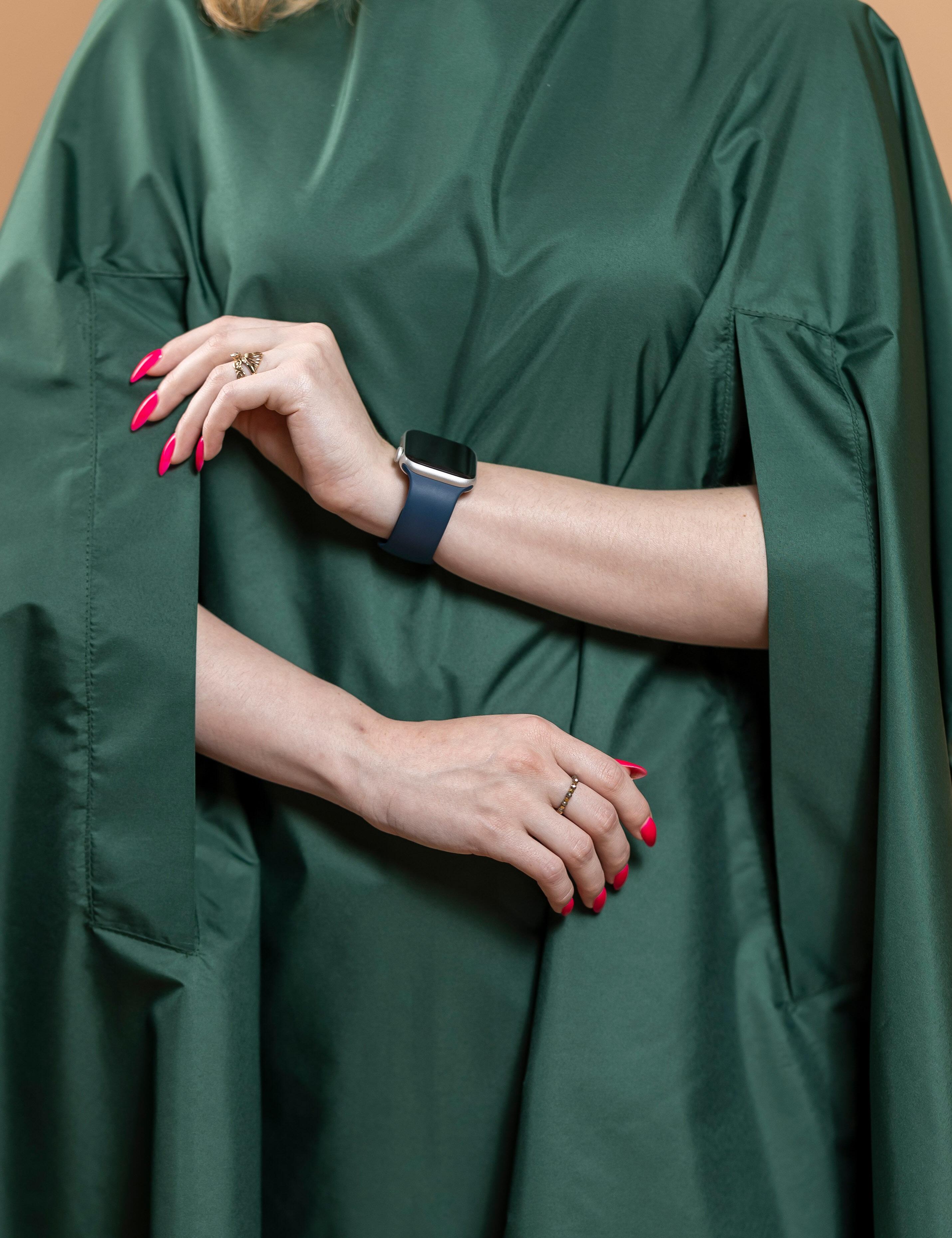 Cape for hairdressers with hand slits bottle green